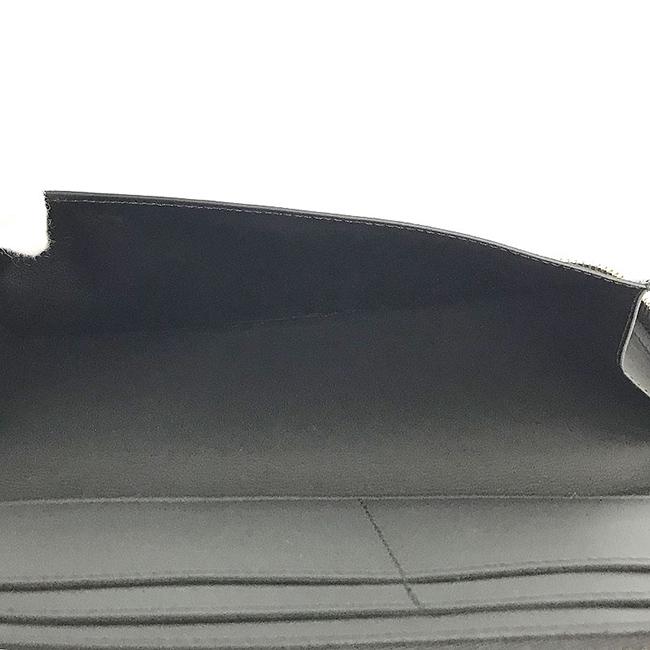 ルイ・ヴィトン LOUIS VUITTON トリヨン ジッピーウォレット・ヴェルティカル ラウンドファスナー 長財布  ノワール トリヨン メンズ財布 M68228