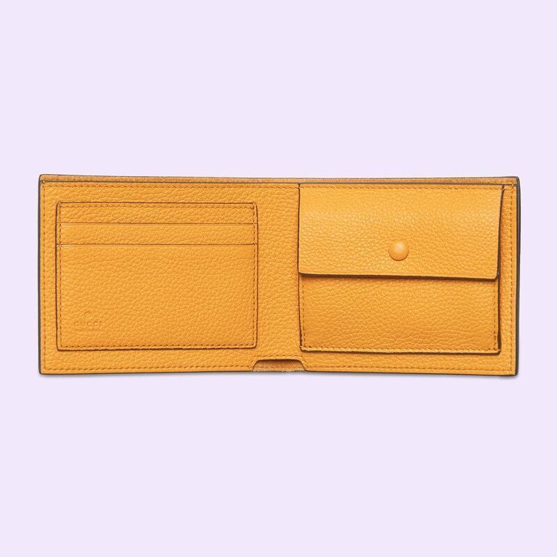 グッチ ロゴエンボス 二つ折り財布/小銭入れ付き 658681 AABEY 7636