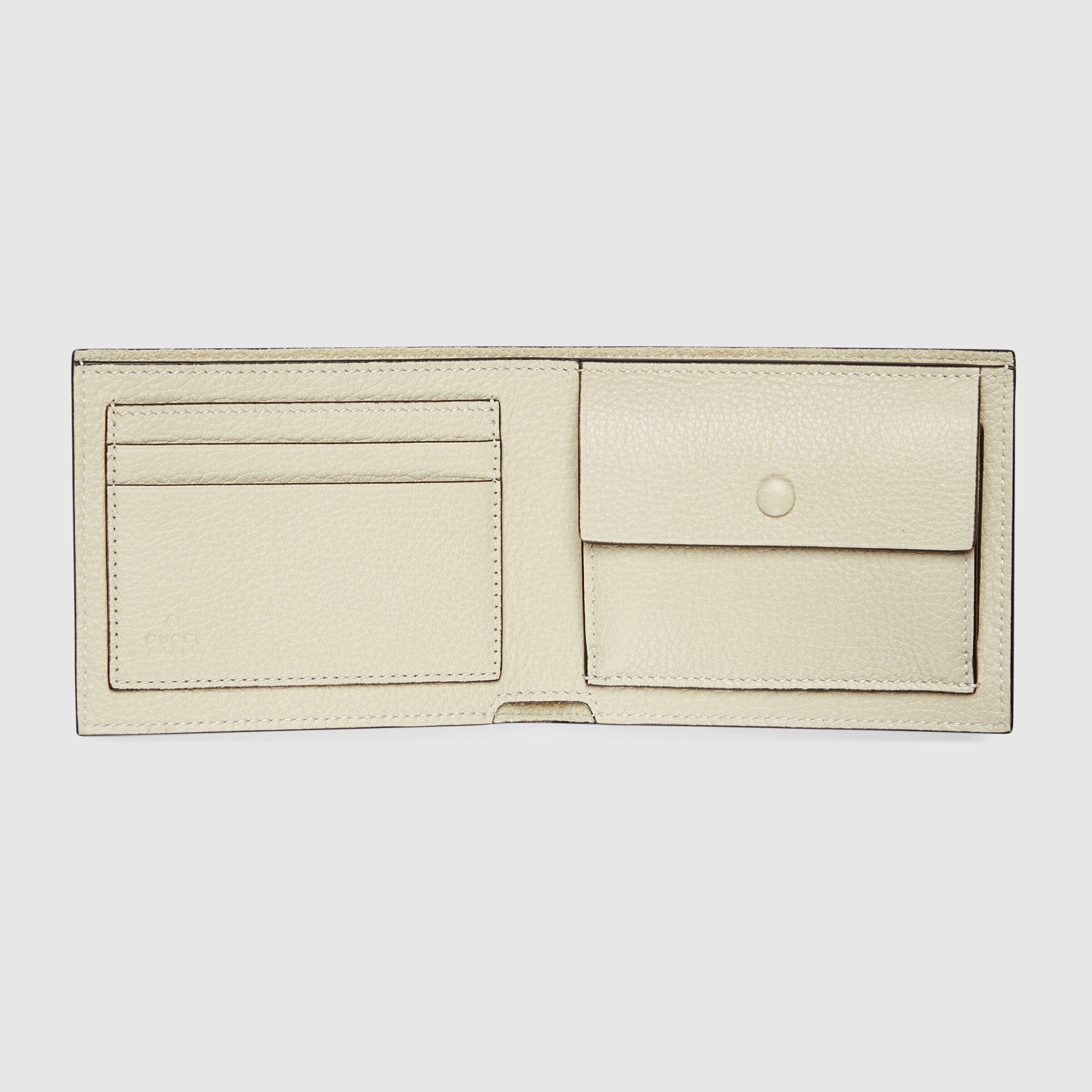 グッチ財布 ロゴエンボス 二つ折り財布/小銭入れ付き 658681 0E8IG 9134