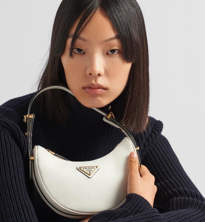 PRADA アーケ Re-Nylon xブラッシュドレザー ショルダーバッグ アーチ型レザー 1BC199_ASK_F0009_V_OOO