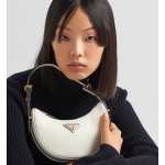 PRADA アーケ Re-Nylon xブラッシュドレザー ショルダーバッグ アーチ型レザー 1BC199_ASK_F0009_V_OOO